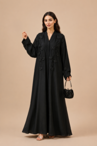 Luxury Black Open Abaya made from premium Zoom Nida fabric featuring elegant handcrafted floral handwork for modern modest fashion.