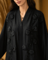 Luxury Black Open Abaya made from premium Zoom Nida fabric featuring elegant handcrafted floral handwork for modern modest fashion.