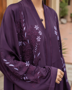 The Amethyst Bloom Embroidered Abaya crafted from premium TikTok fabric featuring elegant DMC Nag embroidery work and an open front luxury modest design.