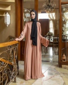 The Blossom embroidered abaya front view in dusty rose with black stole