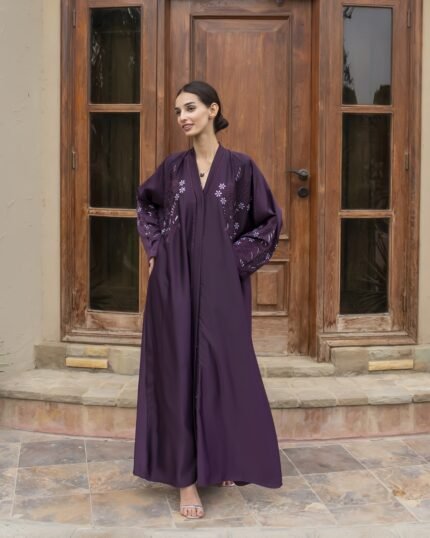 The Amethyst Bloom Embroidered Abaya crafted from premium TikTok fabric featuring elegant DMC Nag embroidery work and an open front luxury modest design.